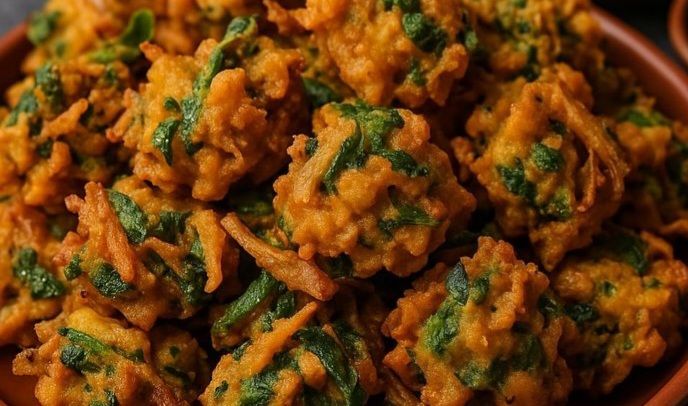 हेल्दी और क्रिस्पी स्प्राउट्स पकोड़ा, हरी चटनी के साथ परोसा गया
